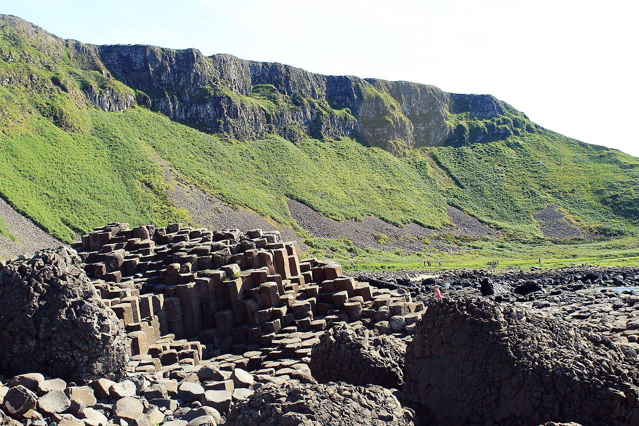 the giant's causeway causeway in the foreground looking toward the mountains behind